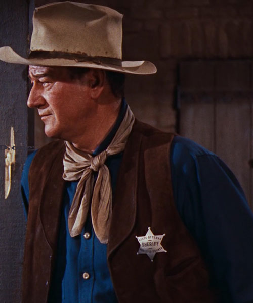 John Wayne as the sheriff in Rio Bravo