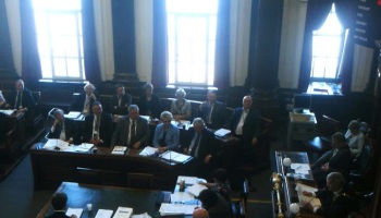 Council Chamber during meeting showing councillors, officers and Mayor's Chaplain