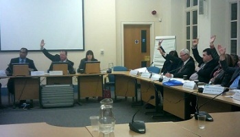 Labour councillors at a public meeting of Wirral Council's Coordinating Committee vote to consult on closing Lyndale School (27th February 2014) (an example of the kind of meeting the regulations will cover)