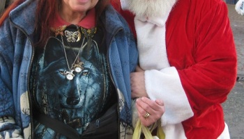 Leonora Brace (my wife) and Councillor Adrian Jones (as Father Christmas) in Birkenhead, Christmas 2013
