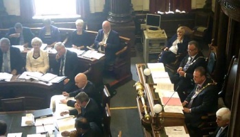Mayor of Wirral Councillor Steve Foulkes and councillors listen to Councillor Phil Davies announce his Cabinet reshuffle 9th June 2014