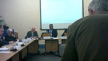 Nigel Hobro (standing) addresses a special meeting of the Audit and Risk Management Committee of Wirral Council 8th October 2014 L to R Cllr Adam Sykes, Cllr David Elderton, Andrew Mossop, Surjit Tour, Nigel Hobro (c) John Brace